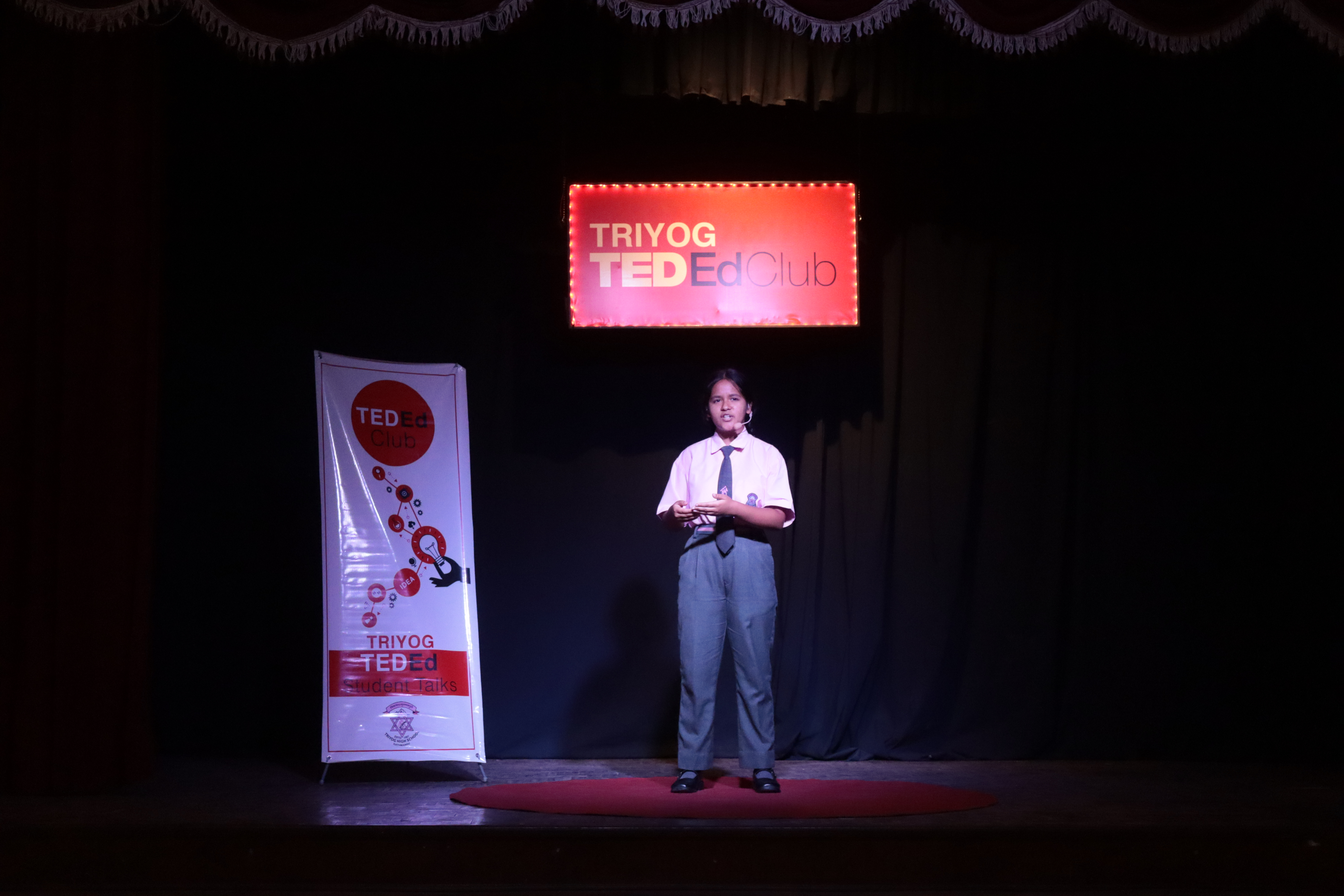 Student performing on stage